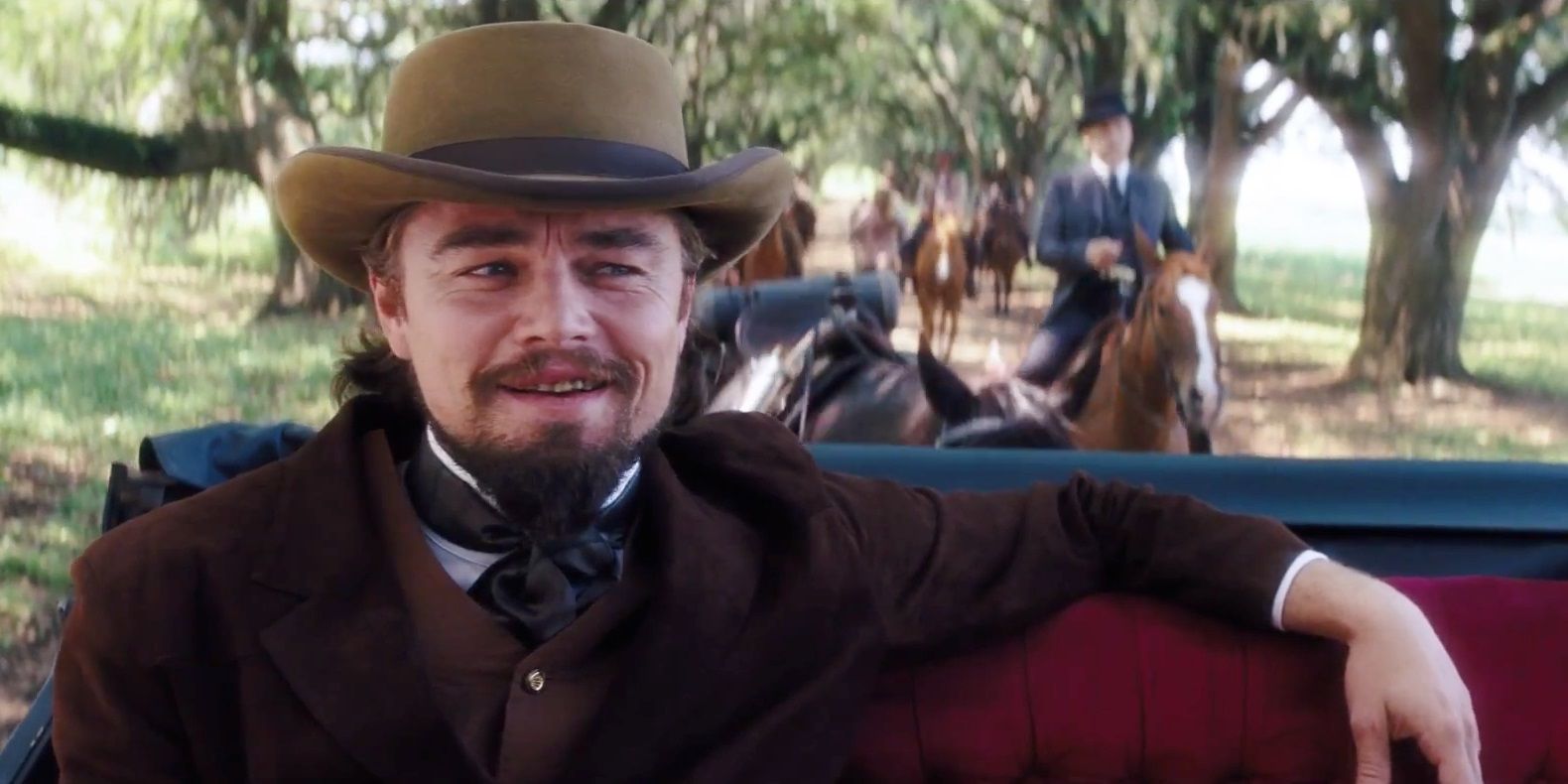 Calvin Candie grins while riding to his plantation in Django Unchained