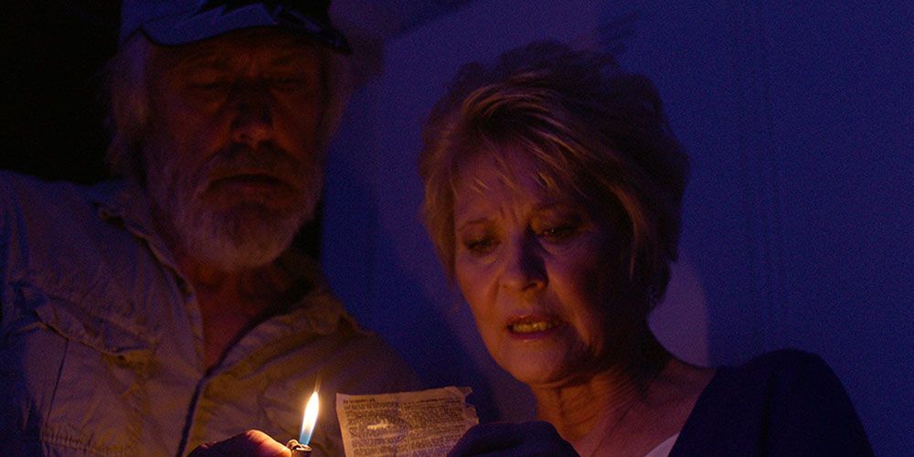 The characters use a lighter to read by in Red Christmas