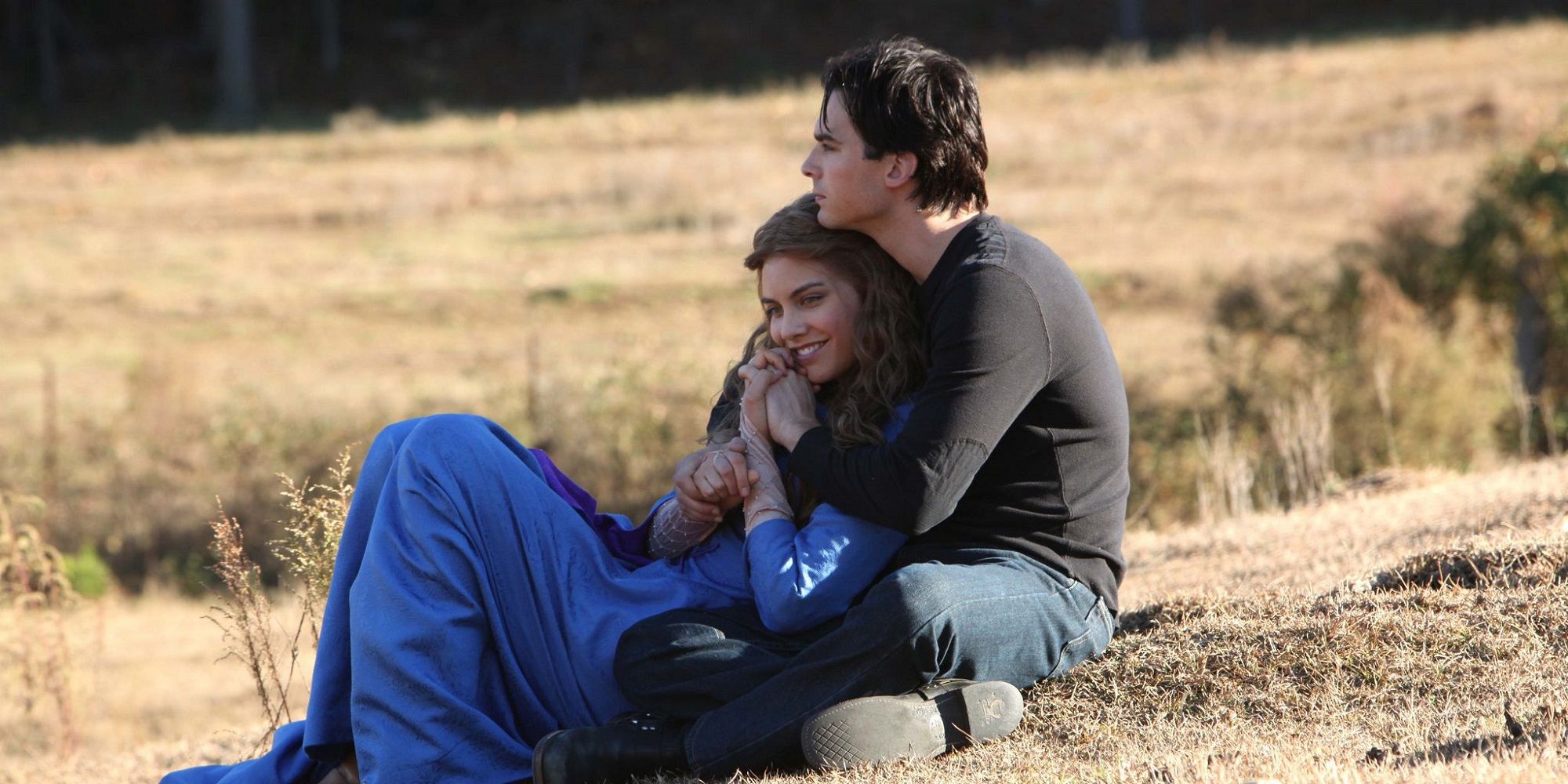Damon holds Rose in The Vampire Diaries