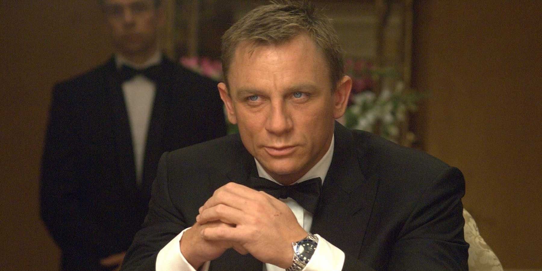 Daniel Craig sitting in a casino in Casino Royale