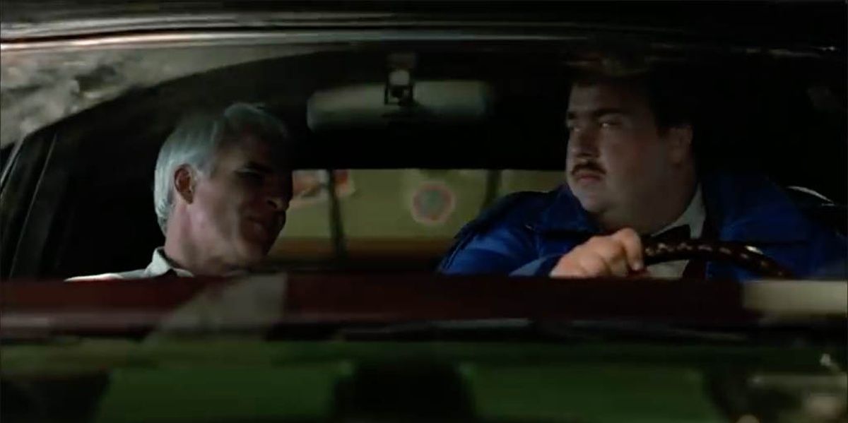 Del and Neal in car, in Planes, Trains and Automobiles