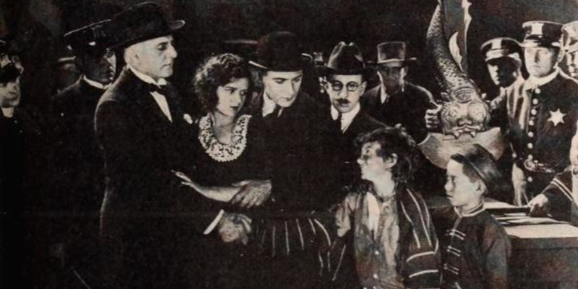 A screenshot from the 1921 silent film Dinty