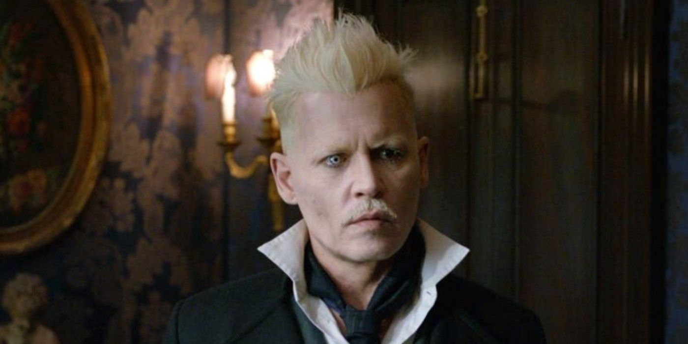 Grindelwald staring ahead with one eye in his suit, Fantastic Beasts