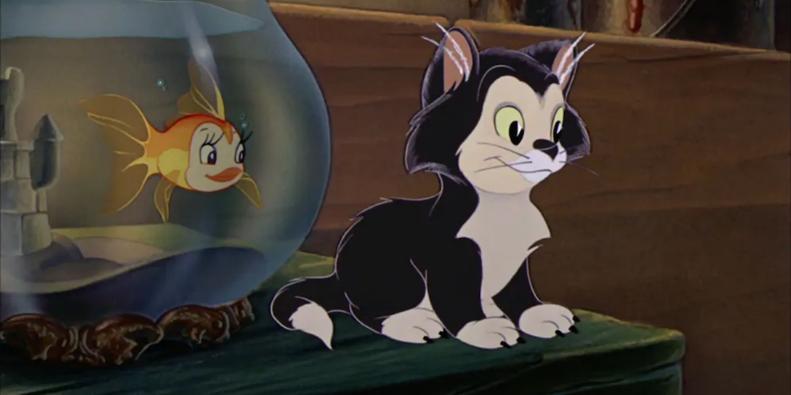 Figaro next to Cleo's tank in Pinocchio