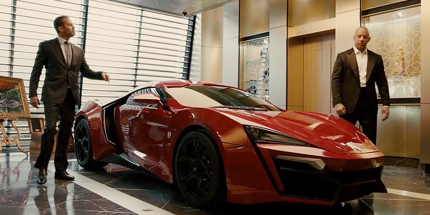 Dom and Brian look at the Lykan Hypersport in Furious 7