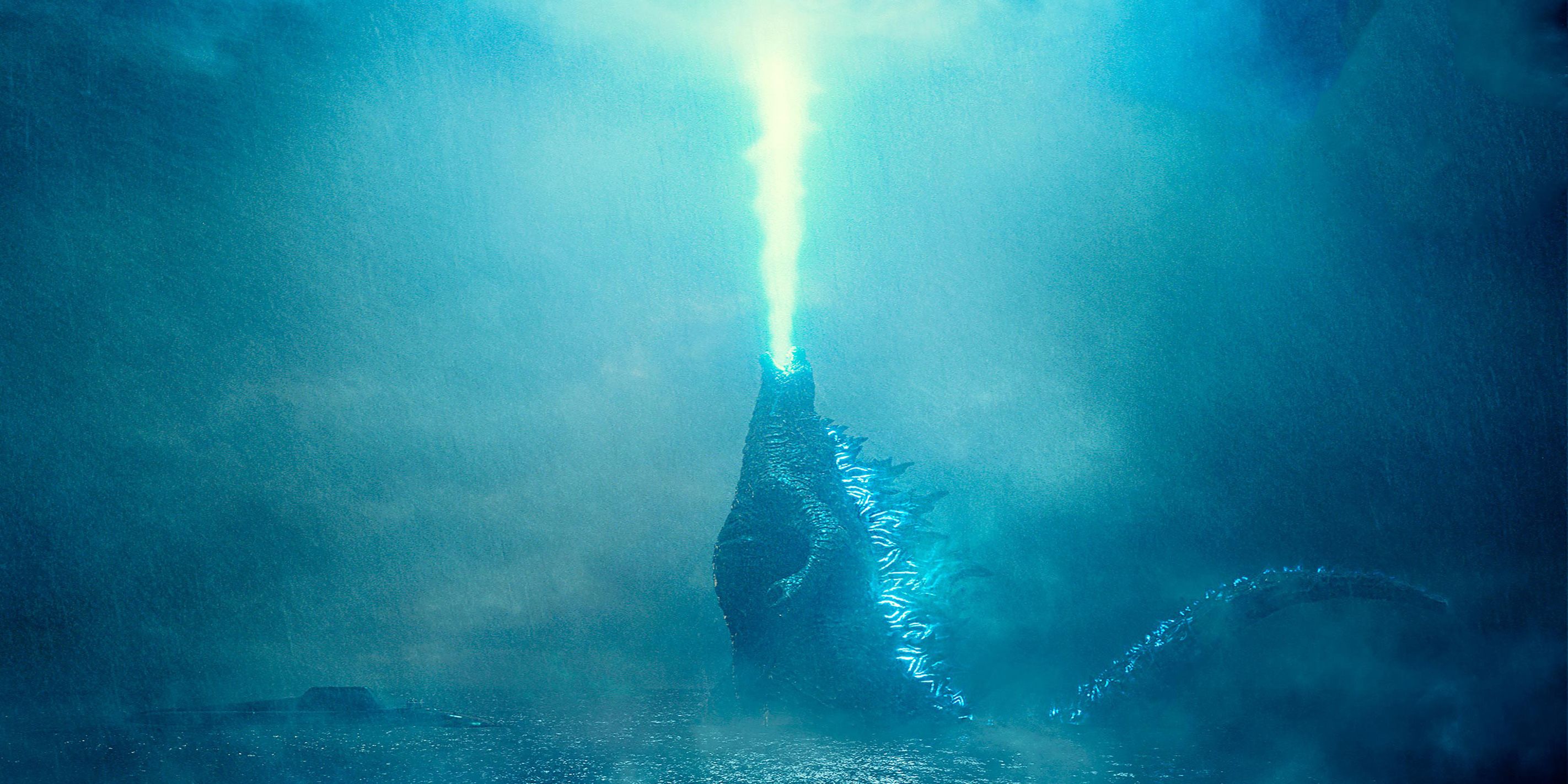 Godzilla shoots his atomic breath up into the sky in front of the submarine in Godzilla King of the Monsters