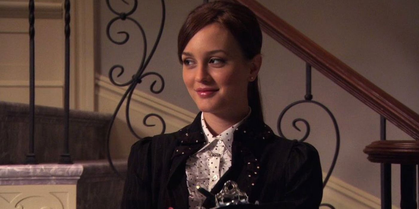 Blair stands in front of the stairs in Gossip Girl