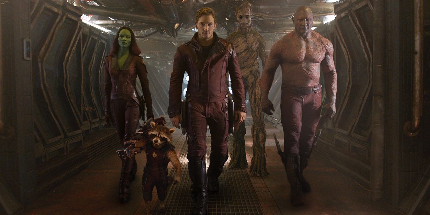 Guardians of the Galaxy walk together in matching uniforms in the Guardians of the Galaxy 