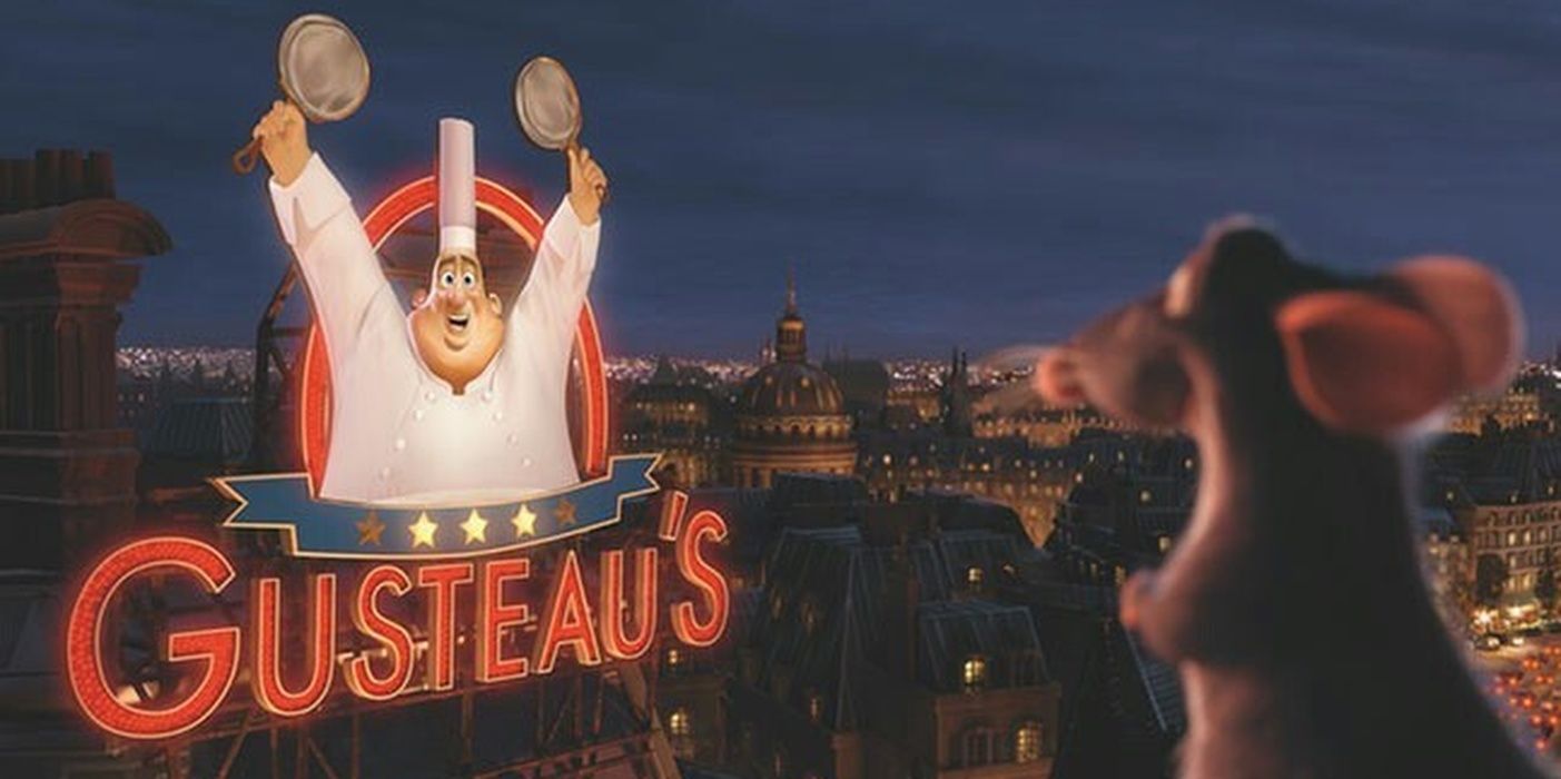 Remy looking at the Gusteau sign at night in Ratatouille.