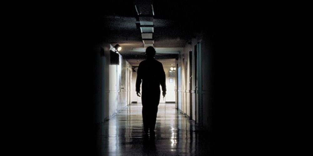 Michael Myers walking down a hall in Halloween II