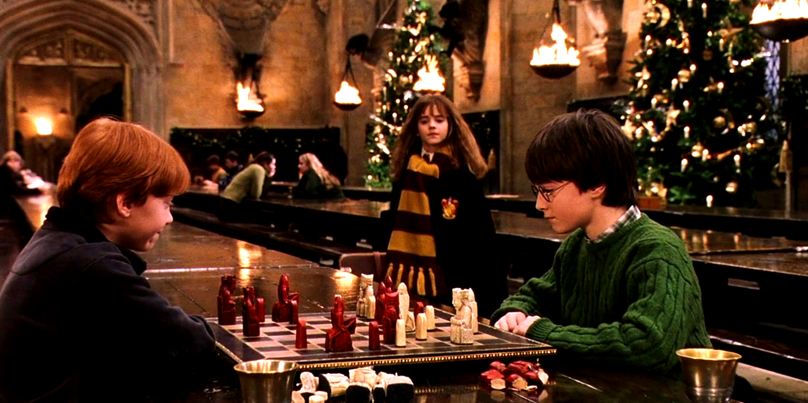Ron, Hermione, and Harry in the Great Hall in Harry Potter and the Sorcerer's Stone