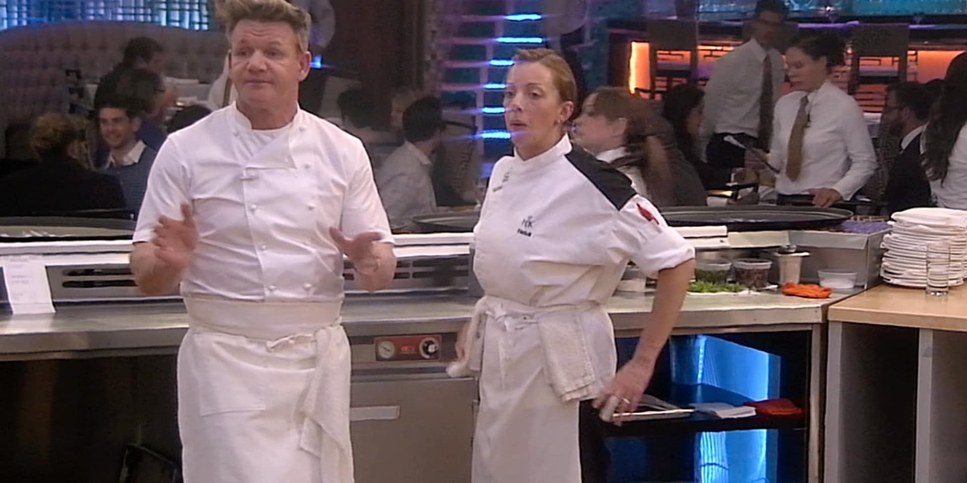 Gordon Ramsey with a chef in Hells Kitchen Season 16