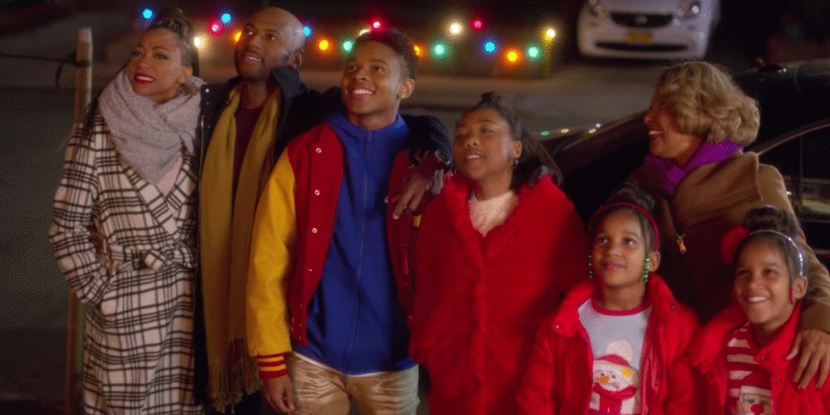 The Williams family looking at Christmas lights in Holiday Rush