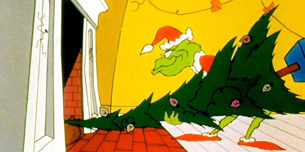 Como o Grinch roubou a cena de Natal com o Grinch enfiando a árvore de natal na chaminé.