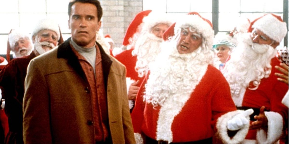 Howard standing with Santas in Jingle All The Way