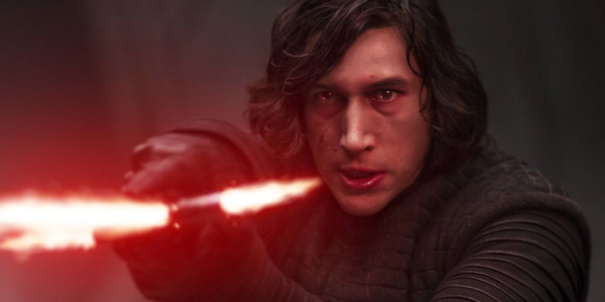 Kylo Ren standing with his lightsaber