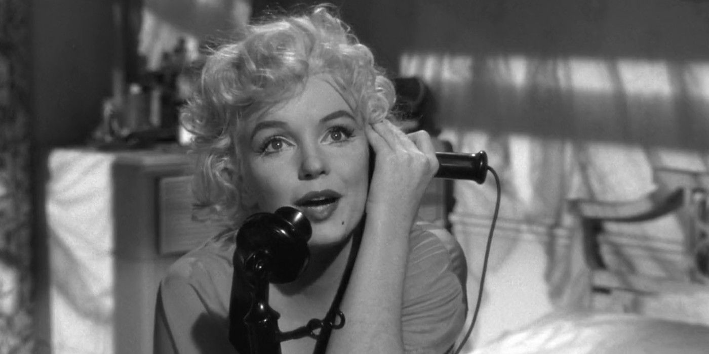Marilyn Monroe talking on a telephone