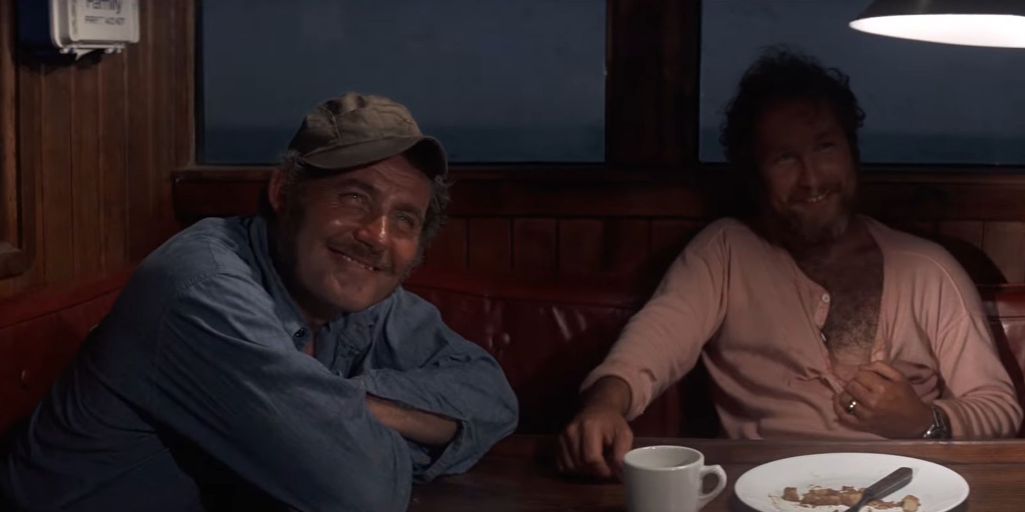 Matt Hooper and Quint laughing aboard the Orca in Jaws