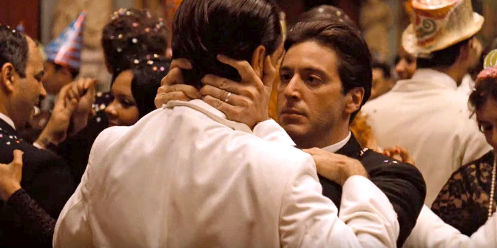 Michael holding Fredo's neck in the middle of a crowd in The Godfather: Part II.