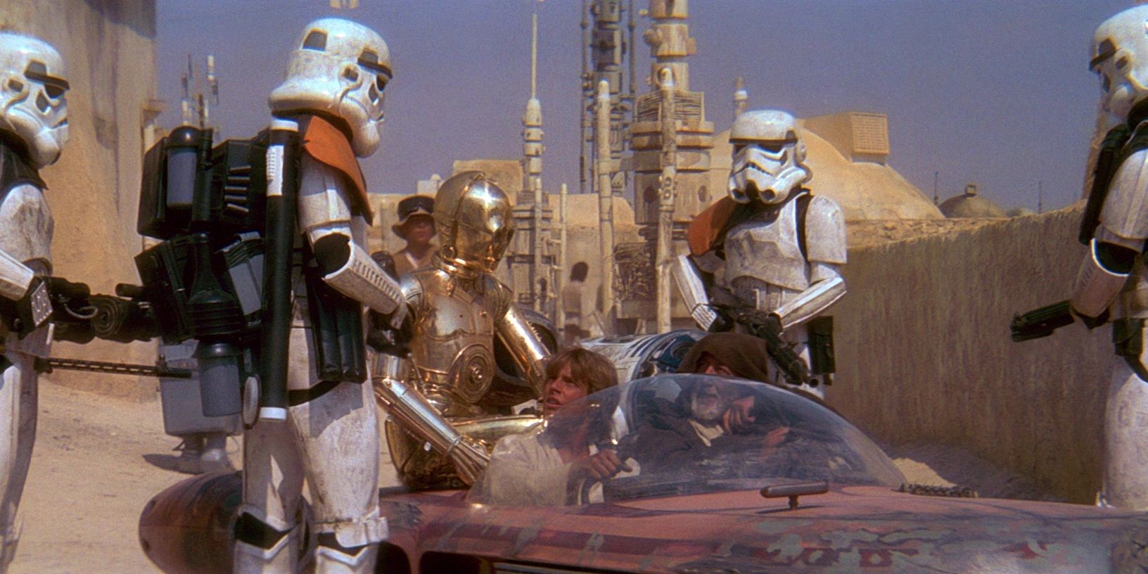 Some Stormtroopers inspect Luke's landspeeder at Mos Eisley Spaceport