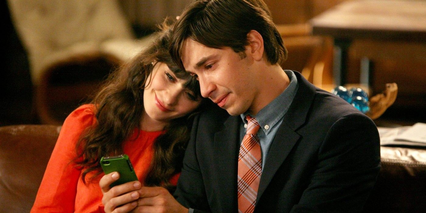 Jess rests her head on Paul's shoulder in New Girl