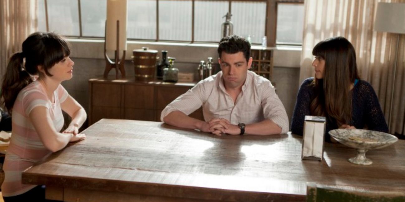 Jess speaks with Schmidt and Cece at the table in New Girl episode Secrets