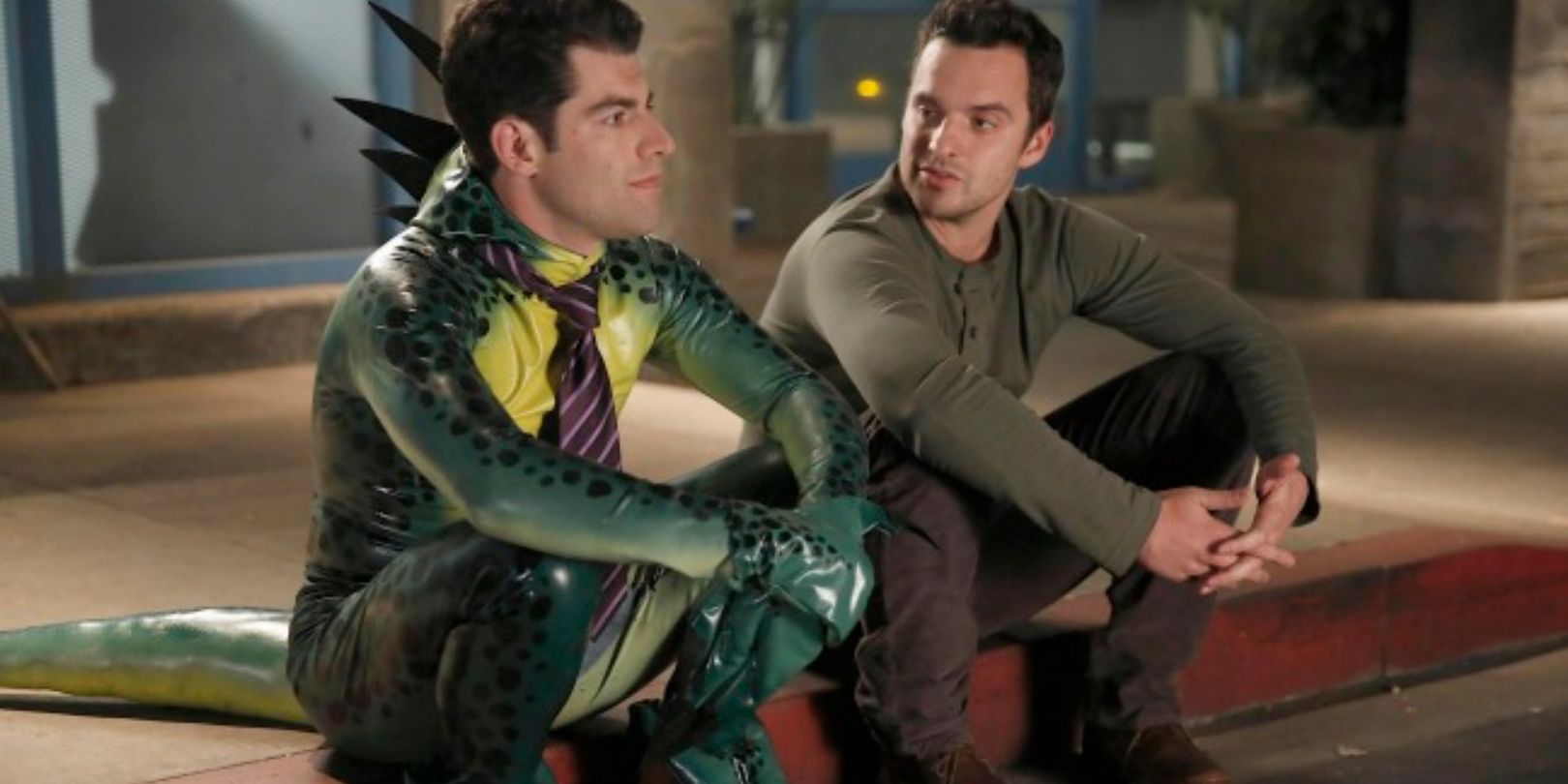 Schmidt and Nick sit on the curb in New Girl S3E06 Keaton
