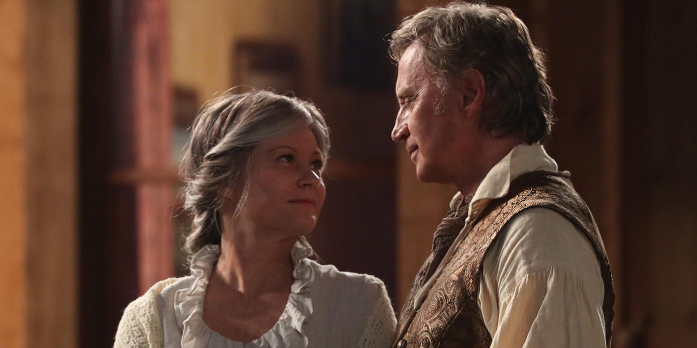 Emilie de Ravin as Belle and Robert Carlyle as Rumplestiltskin in Once Upon A Time