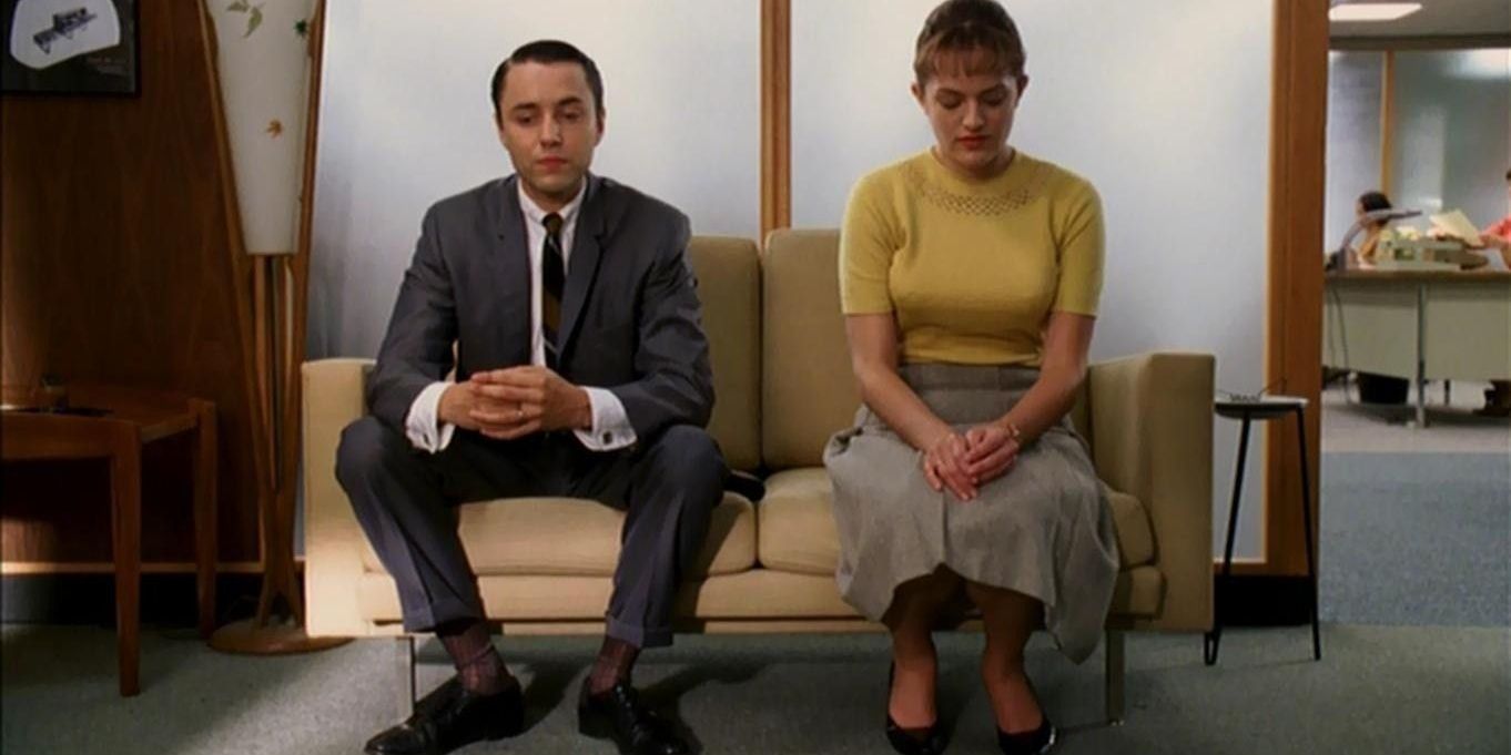 Pete and Peggy sitting together looking umcomfortable in Mad Men