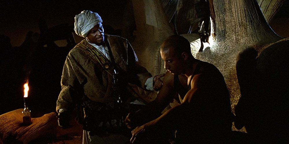 Abu al-Walid speaking with Riddick in Pitch Black