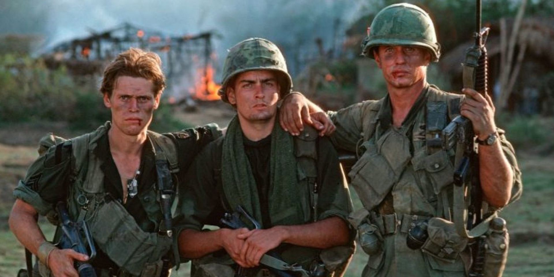 Willem Dafoe, Charlie Sheen, and Tom Berenger in Platoon