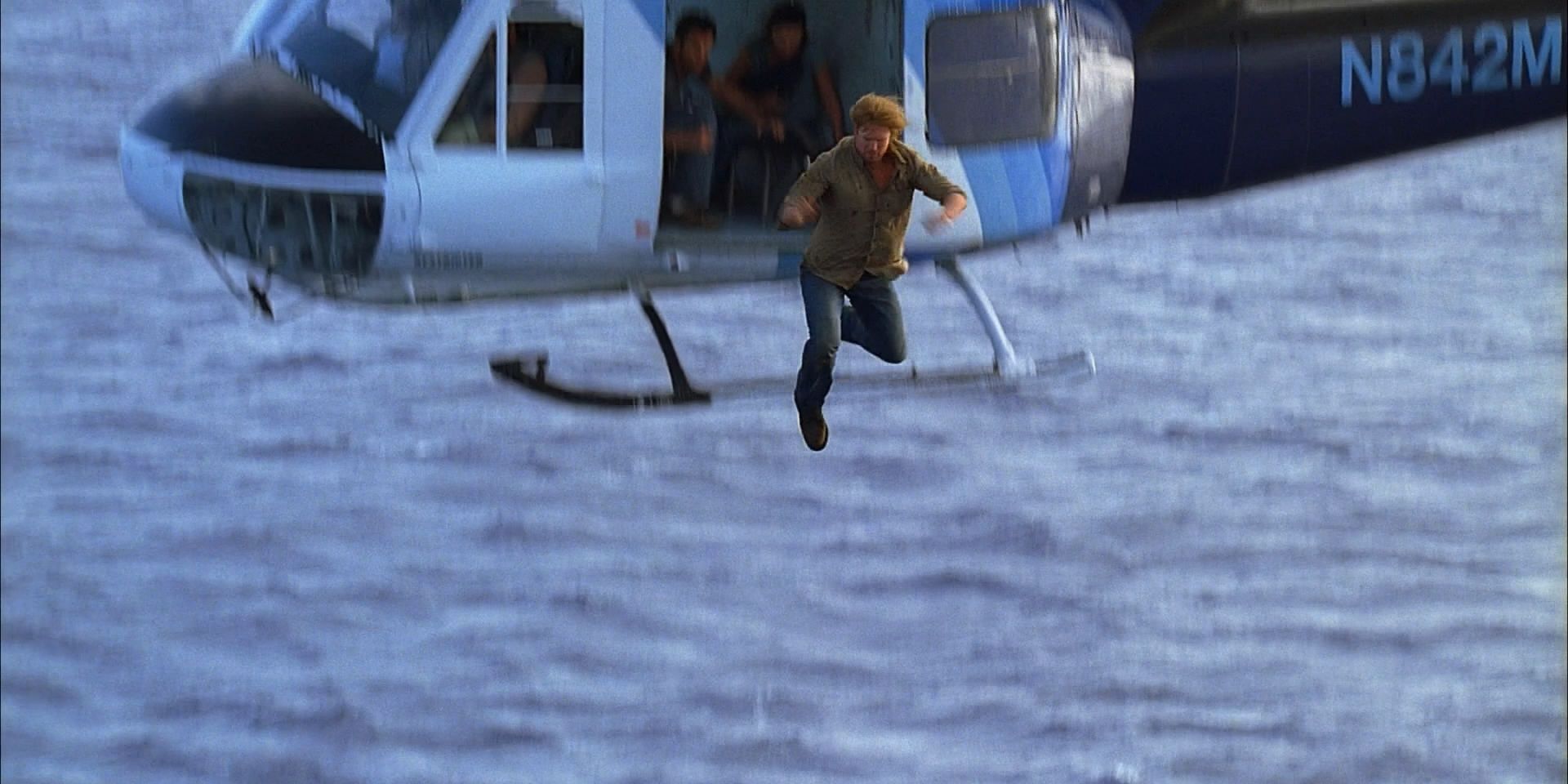 Sawyer jumps from the helicopter