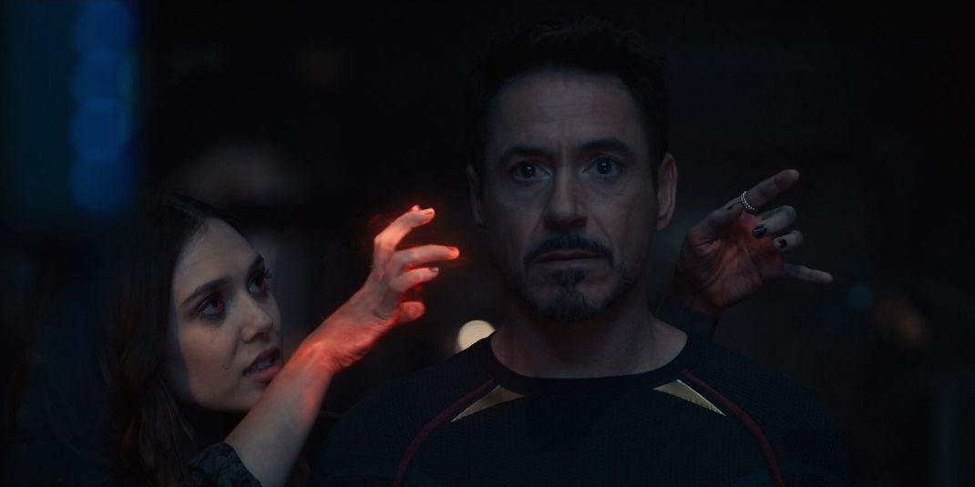 Scarlet Witch distracts Tony Stark