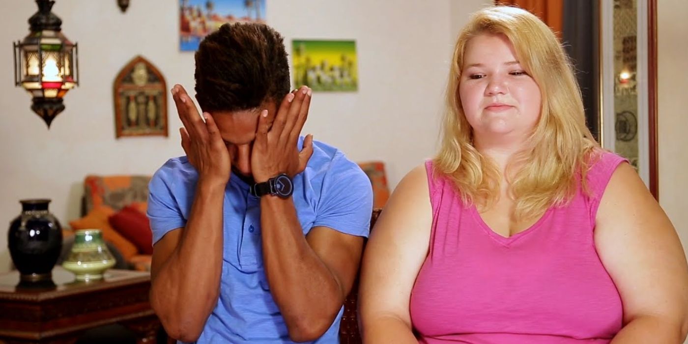 Nicole Nafziger Azan Tefou: TLC: 90 Day Fiancé Azan with face in hands next to Nicole for interview