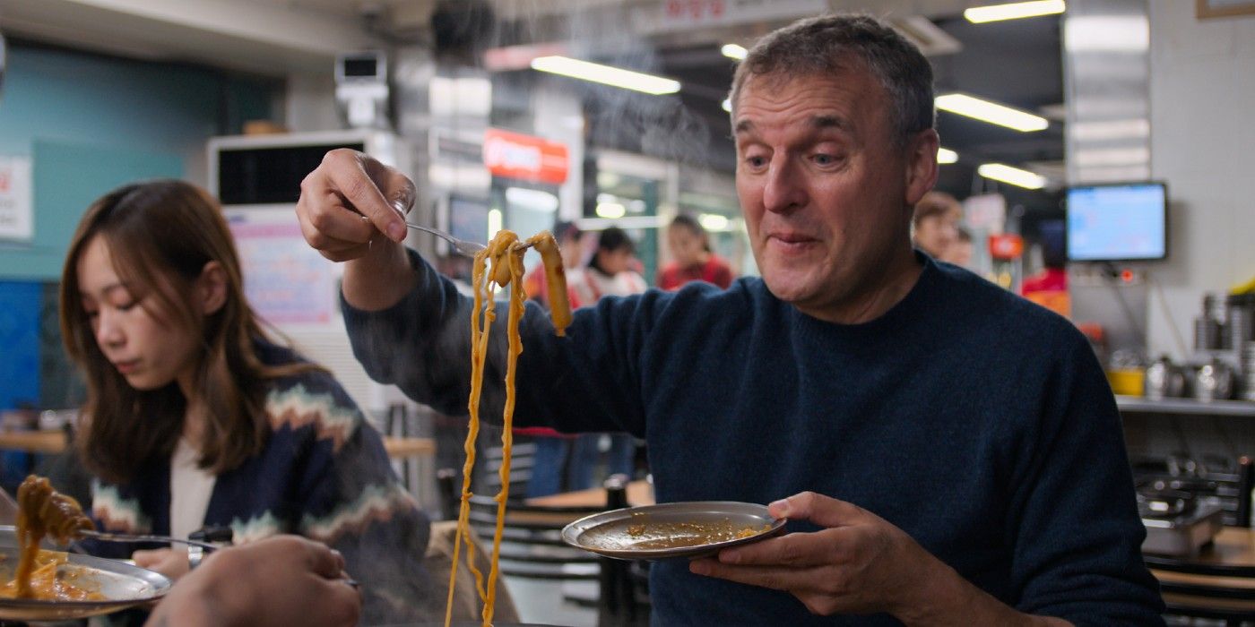 Phil Rosenthal: Netflix: Somebody Feed Phil eating noodles