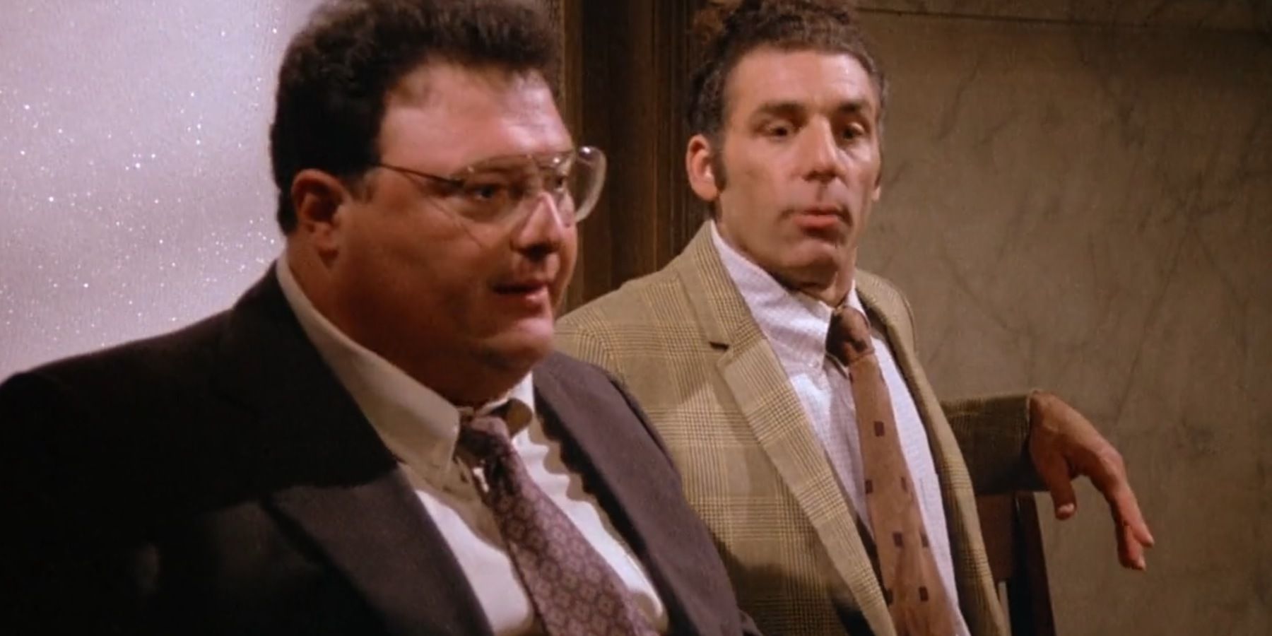 Newman and Kramer wearing suits on Seinfeld