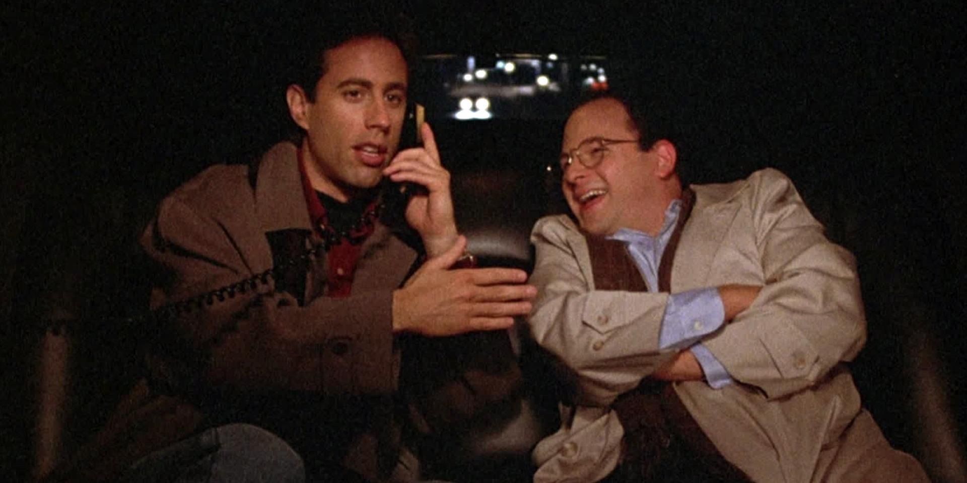 George laughs as Jerry talks on the phone in a limo in Seinfeld.