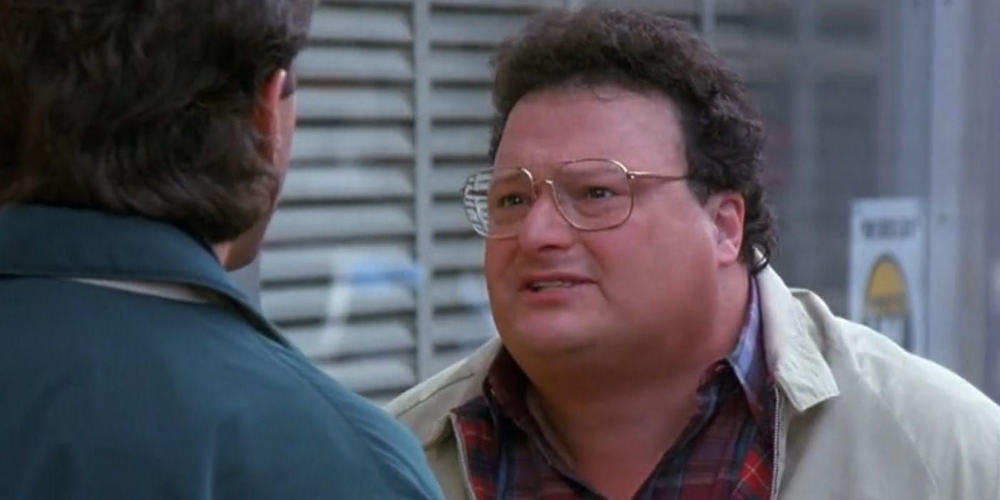 Newman talking to Jerry outside in Seinfeld