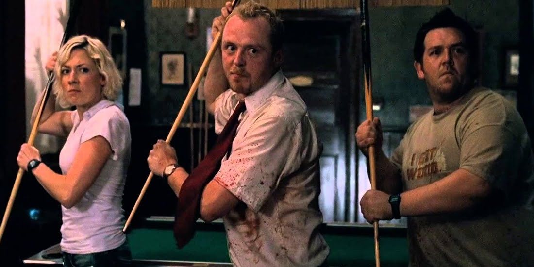 Shaun, Ed, and Liz holding pool cues in Shaun of the Dead