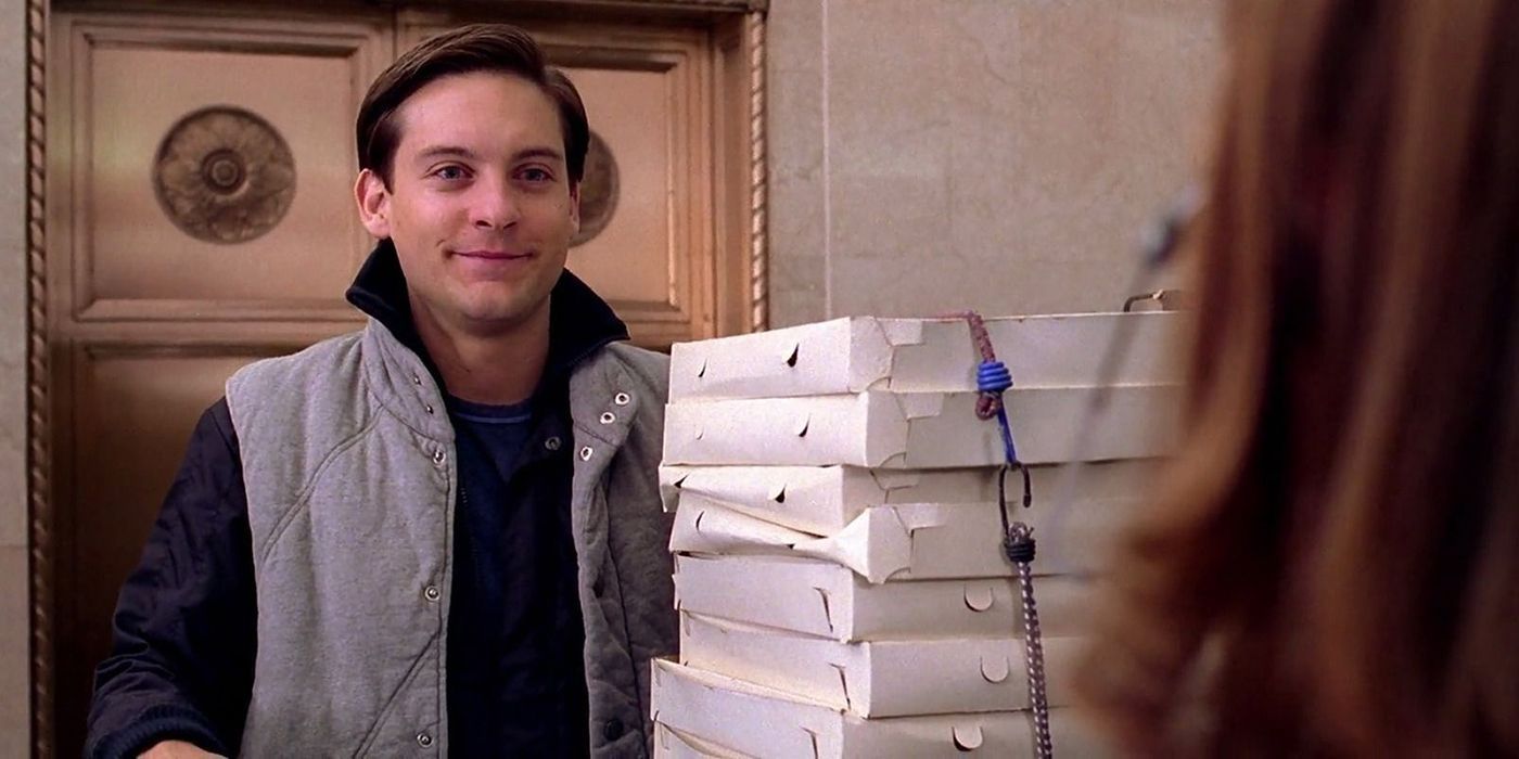 An image of Peter smiling while delivering pizzas in Spider-Man 2