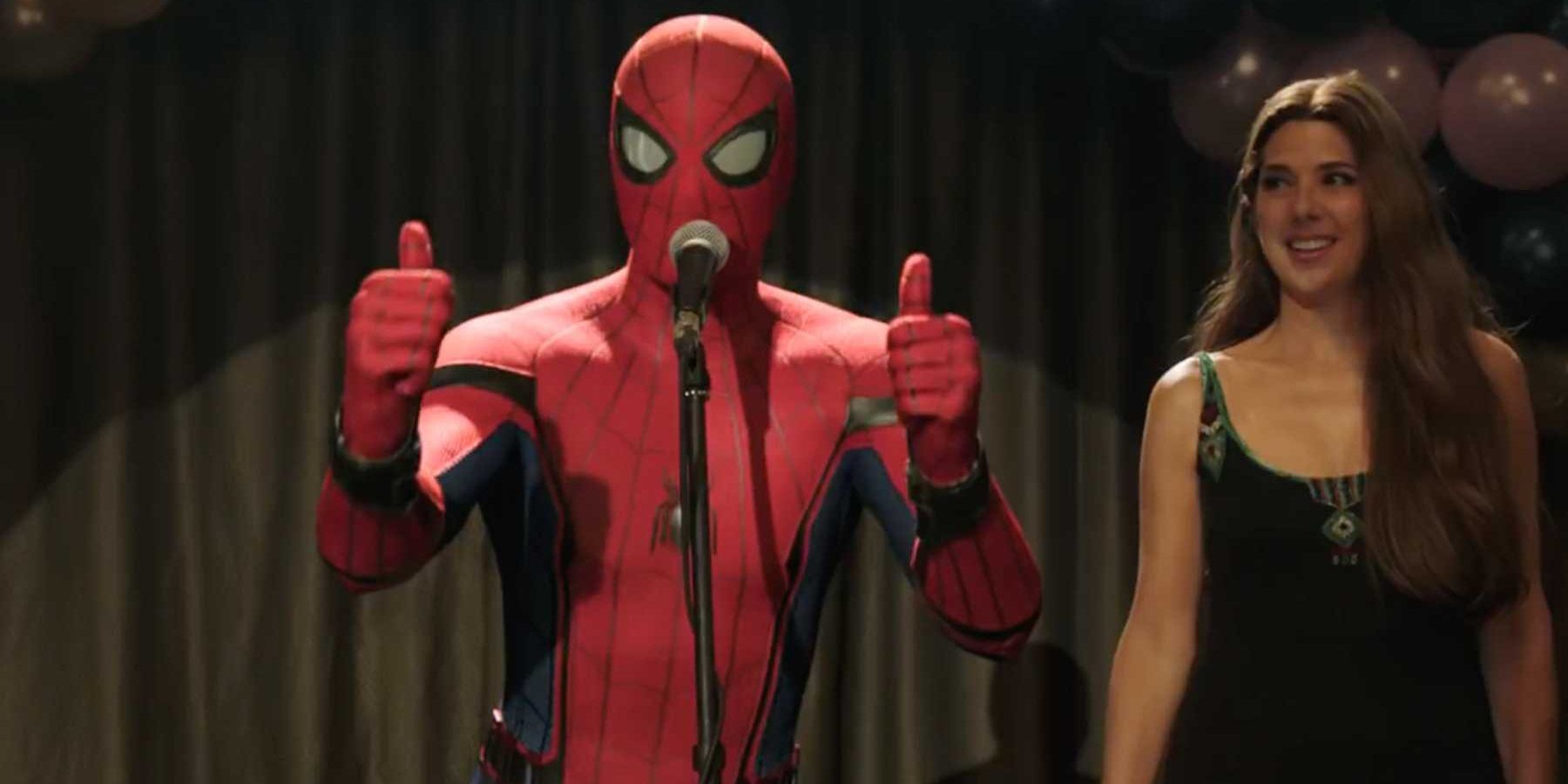 Spidey giving thumbs up on stage with Aunt May in Spider-Man: Far From Home