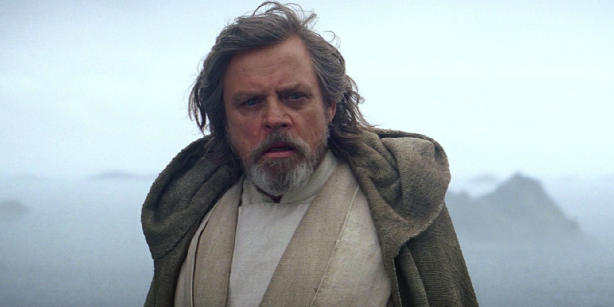 Luke stands on a hill in Star Wars The Force Awakens