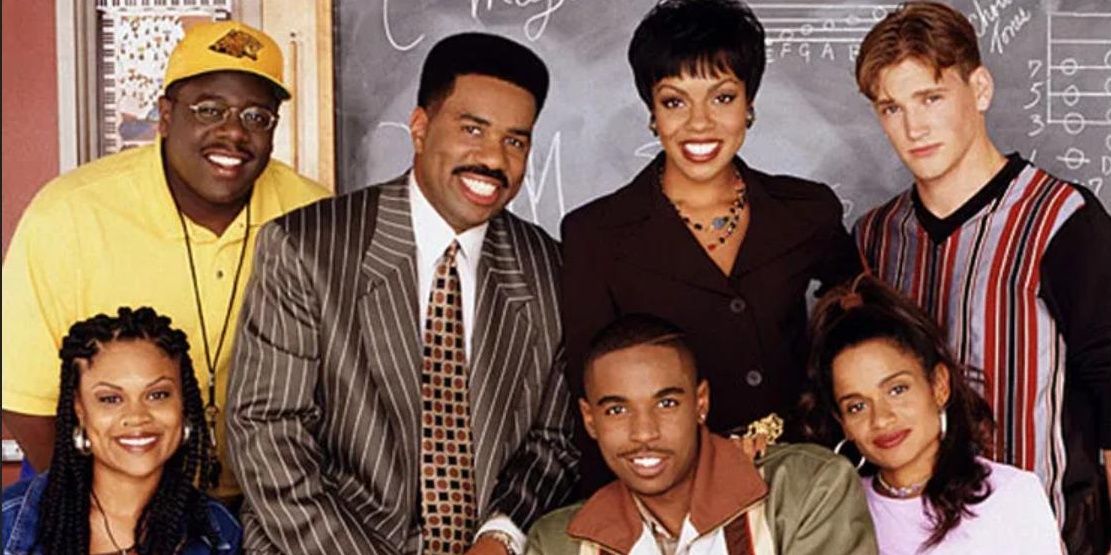 The cast of The Steve Harvey Show in front of the chalkboard