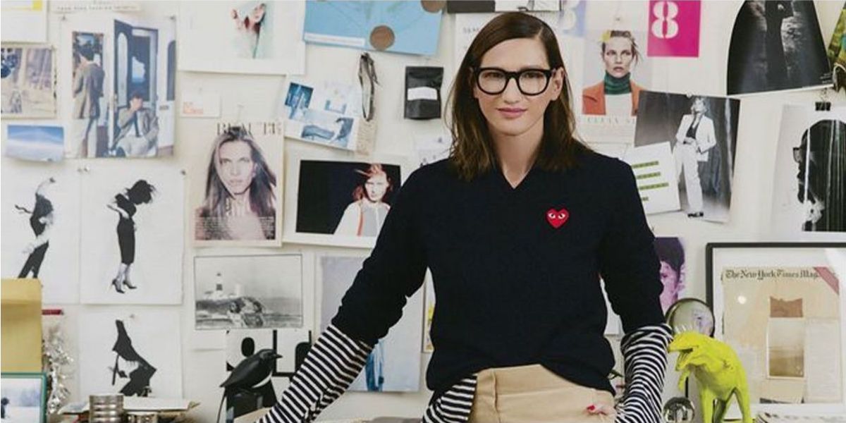 Jenna Lyons in front of her clothing
