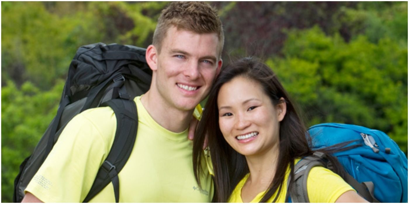 Ernie and Cindy wearing yellow T-shirts and smiling for the camera in a The Amazing Race promo image.