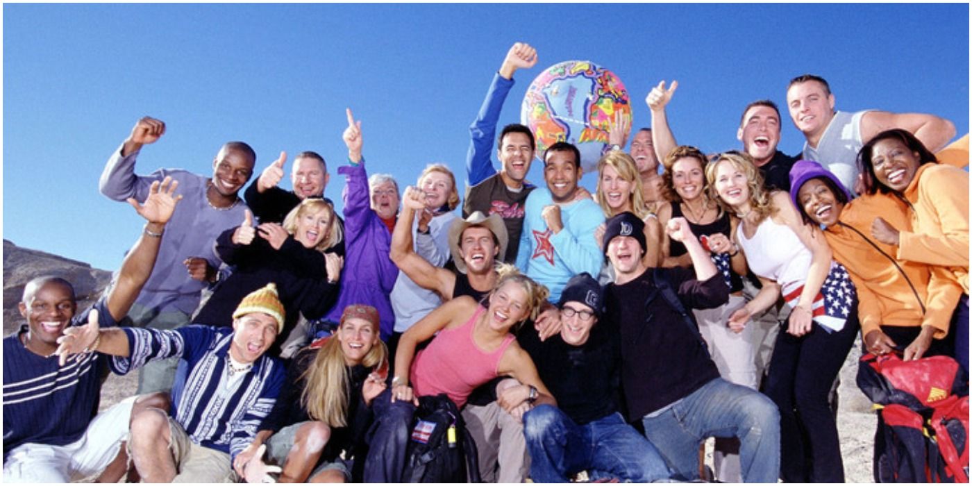The entire cast of The Amazing Race season 2 poses for a cast photo.