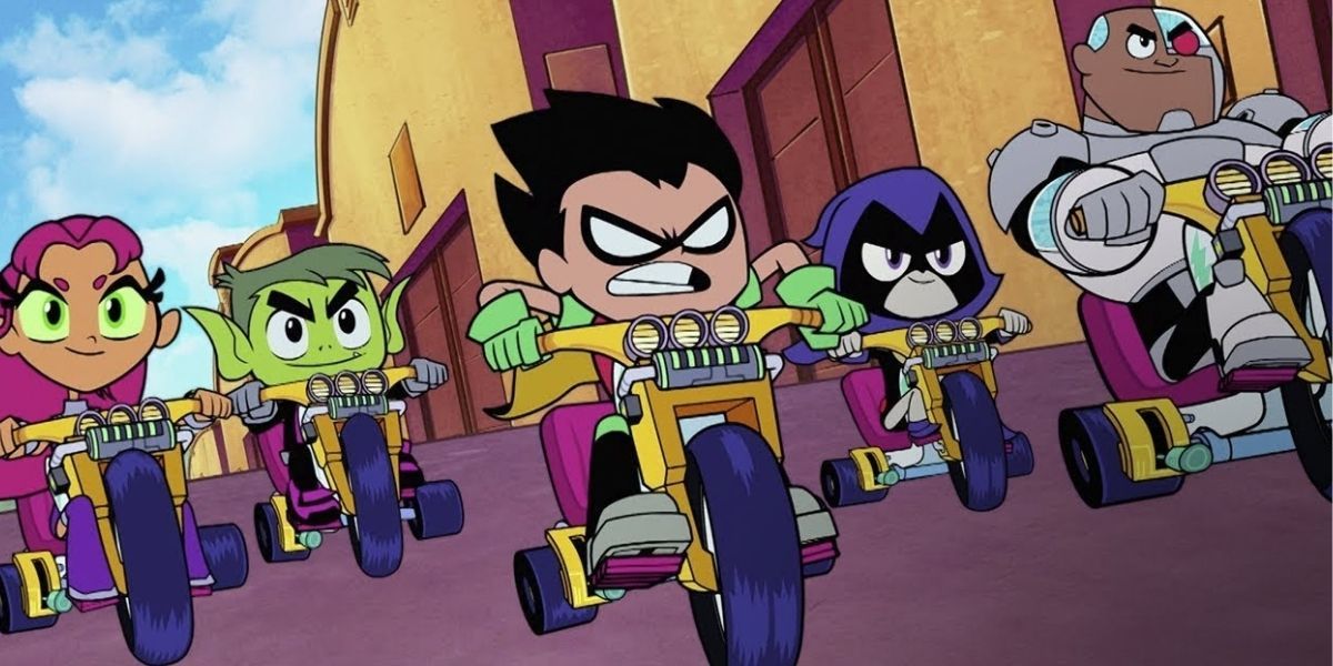 Teen Titans Go! cast riding a tricycle