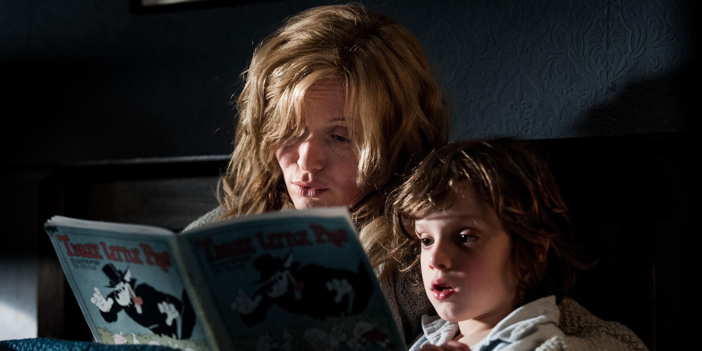 Amielia reading her son a book in The Babadook