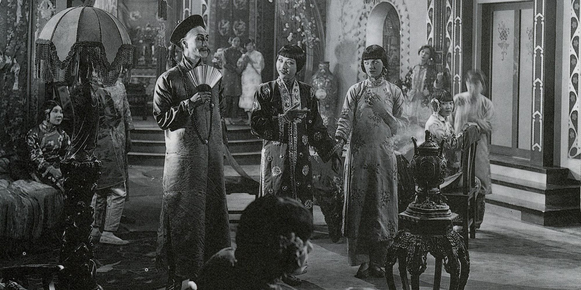 A screenshot of a banquet scene from The Crimson City