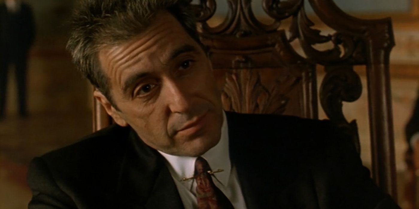 Al Pacino as Michael Corleone sitting in a chair in The Godfather Part III